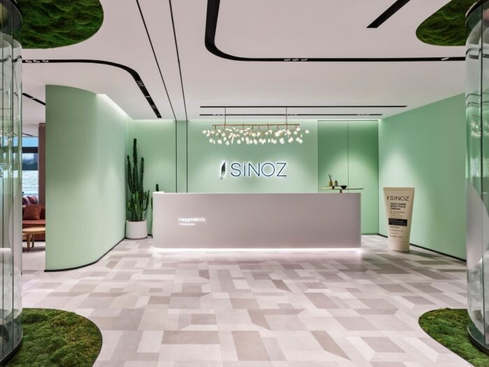 Sinoz化妆品办公室设计，采用粉彩色调突出产品优势